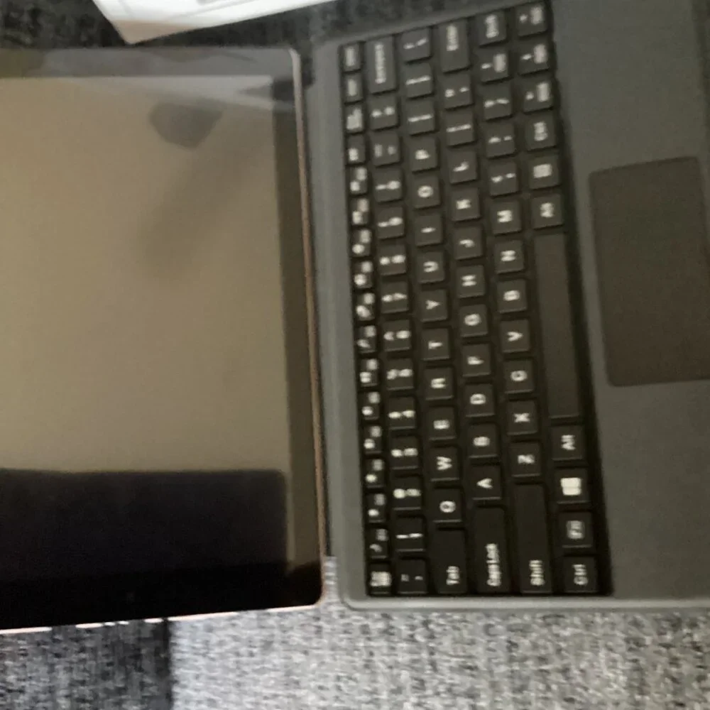 New RCA 2-in-1 Notebook/tablet w/keyboard & head phone